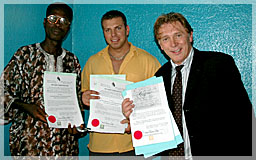 James Arku, Michael Lindstrom and Len Lindstrom with first Liberty licenses June 2004