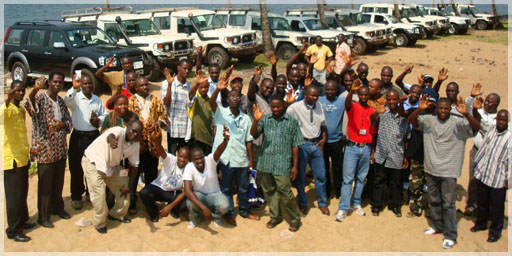 A portion of Liberty’s geologists, field technicians and truck fleet in Liberia Christmas 2007