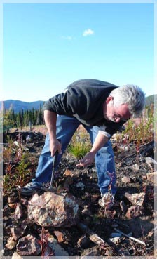 Bruce Doyle (optionee) sampling on the Big Buck Moly - Mt Nelson