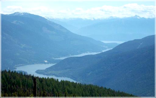 View from top of Mt Nelson overlooking the West Arm and town of Nelson directly to the right on far side of lake