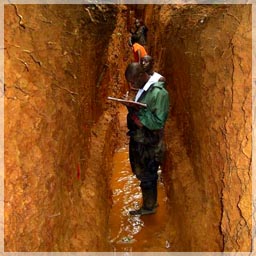 Geologist mapping Trench Walls / Mandingo Hill