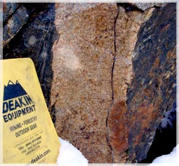 Bornite staining on rock / Greenhorn