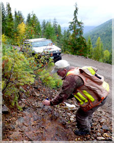 Prospector Bruce Doyle (optionee) sampling main outcropping / Silver Lynx